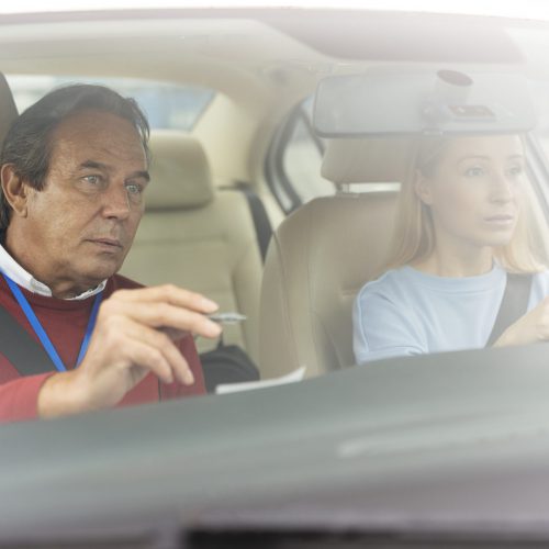 person-taking-driver-s-license-exam